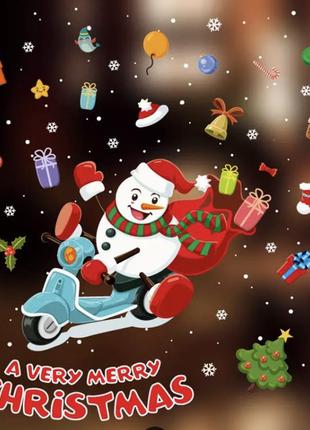 Різдвяні наклейки на вікна "сніговик на скутері" - картина на 2-х листах розмірами 35*50см, силікон