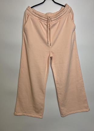 Трикотажные брюки на флисе с широкими штанинами