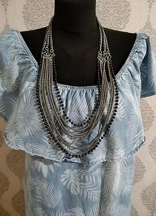 Багатоярусна ланцюжок в срібному кольорі з невеликими намистинами. довжина 75 см