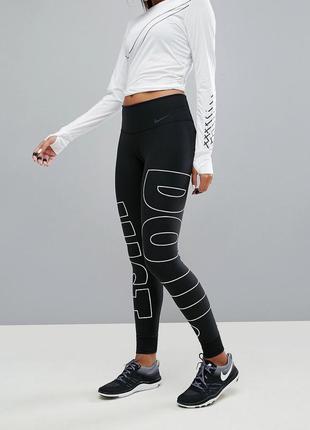 Женские лосины леггинсы тайтсы nike nike leggings with large just do it logo3 фото