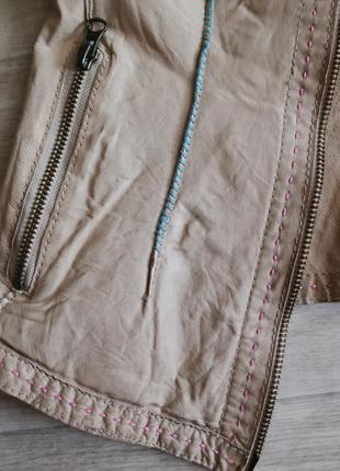 Стильный кожаный пиджак на молнии4 фото