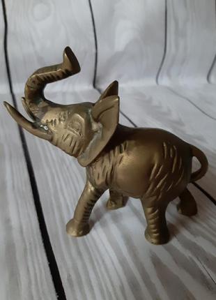 Бронзовая, коллекционная статуэтка слона.
