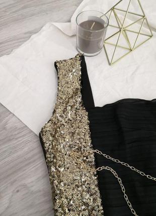 Красивое черное платье со вставками золотых пайеток5 фото