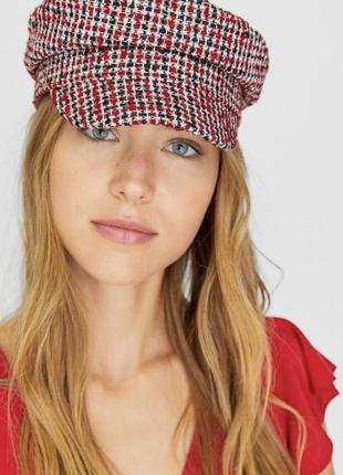 Утеплена кепка в клітинку