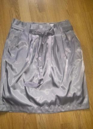 Красива фактурна спідниця з кишенями