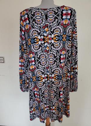Шикарное брендовое трикотажное платье красивой расцветки свободного фасона6 фото