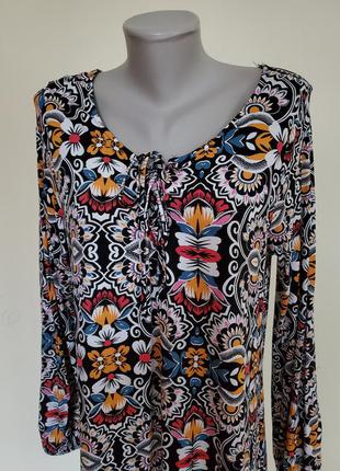 Шикарное брендовое трикотажное платье красивой расцветки свободного фасона3 фото