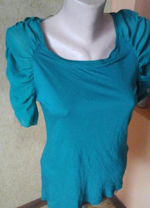 Зеленая футболка фирмы atmospere