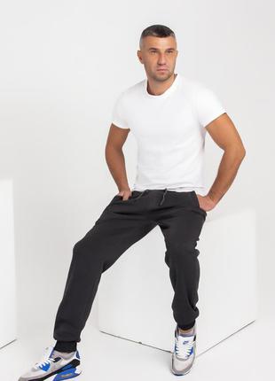 Темно-сірі утеплені флісом спортивні штани з манжетами3 фото