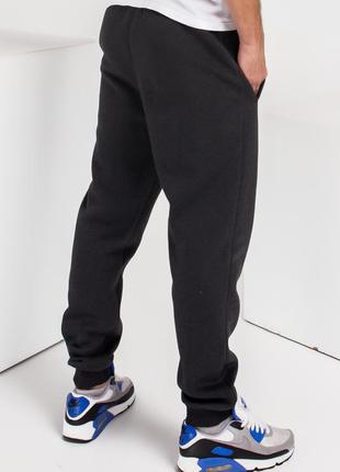 Темно-сірі утеплені флісом спортивні штани з манжетами2 фото