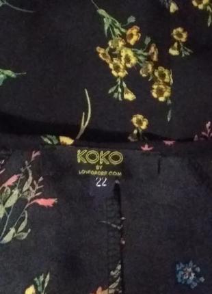 Блузка чёрная в цветы.60р-р. очень красивая. см мерочки. 22 евро.5 фото