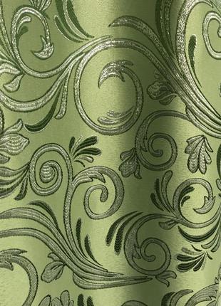 Портьерная ткань для штор жаккард зеленого цвета с вензелями