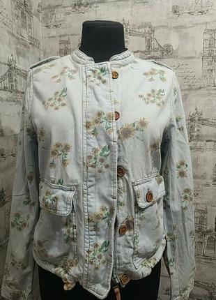 Блакитна джинсовці в квіточку, з замочком і гудзиками