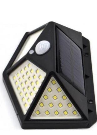 Комплект світлодіодних настінних світильників на сонячній батареї solar motion 100 led з датчиком руху 2 шт. чорний.2 фото