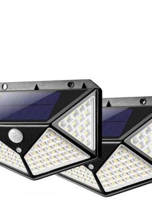Комплект світлодіодних настінних світильників на сонячній батареї solar motion 100 led з датчиком руху 2 шт. чорний.7 фото