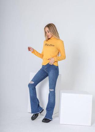 Ультрамодные джинсы клеш с бахромой2 фото