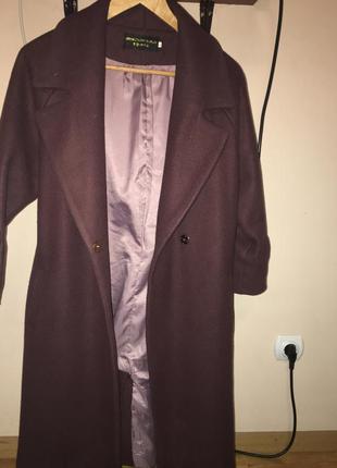 Пальто с бантами на рукавах