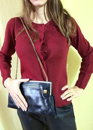 Кардиган вовняної на гудзиках. є серійний номер.