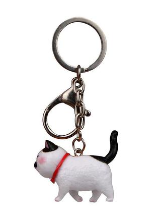 Брелок на рюкзак, сумку, ключі: щасливий кіт, веселе кошеня, білий з чорними плямами котик1 фото