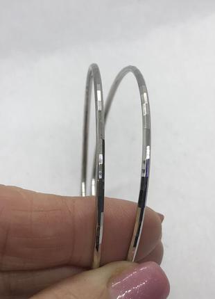 Серьги кольца серебряны, родиевое покрытие1 фото