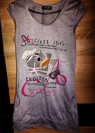 Туніка з принтом і блискітками