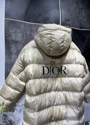 Подовжений пуховик зима