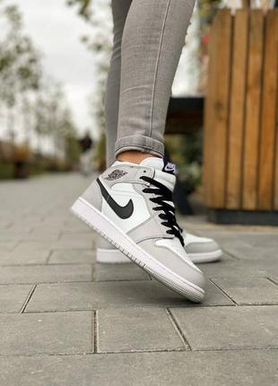 Классные женские зимние высокие кроссовки nike air jordan 1 retro mid grey серые на меху2 фото