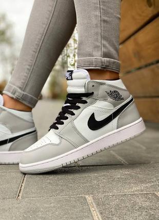 Классные женские зимние высокие кроссовки nike air jordan 1 retro mid grey серые на меху5 фото