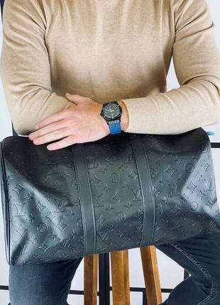 Дорожня сумка чоловіче шкіряне чорна брендовий3 фото