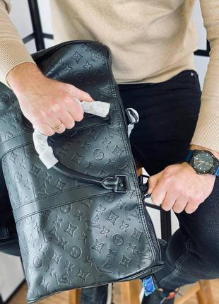 Дорожня сумка чоловіче шкіряне чорна брендовий5 фото