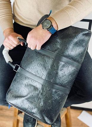 Дорожня сумка чоловіче шкіряне чорна брендовий4 фото