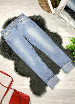 Стрейчевые джинсы украшенные бусинами1 фото