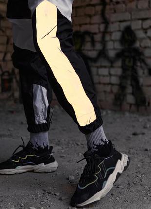 Теплые спортивные штаны split черно-белые с рефлективом5 фото