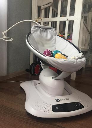 Заколисуючий центр 4moms