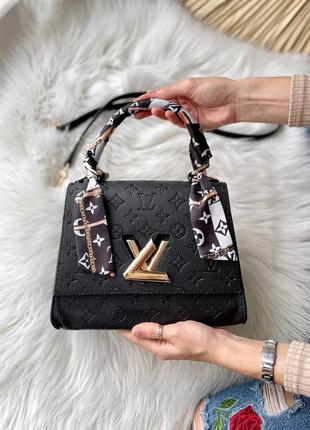 Красивая женская кожаная сумочка в стиле louis vuitton twist black клатч чёрная1 фото