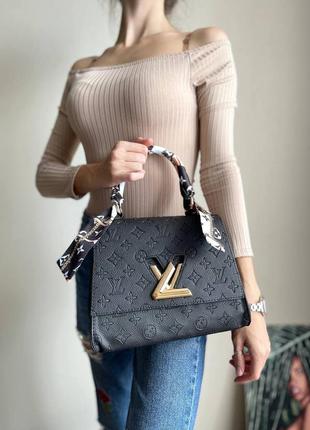 Красивая женская кожаная сумочка в стиле louis vuitton twist black клатч чёрная2 фото