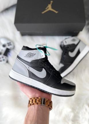 Стильные женские высокие зимние кроссовки nike air jordan 1 retro mid black grey чёрные с серым на меху2 фото