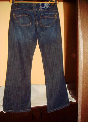 Широкие джинсы клеш с низкой посадкой3 фото