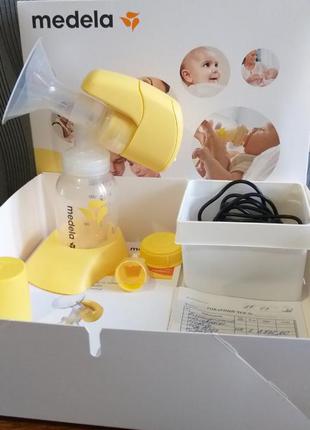 Електричний молоковідсмоктувач medela mini electric2 фото