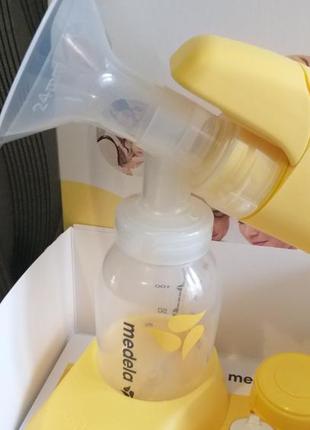 Электрический молокоотсос medela mini electric5 фото