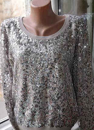 Блискучий яскравий светр в паєтках