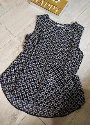 Літня блузка з геометричним принтом.1 фото