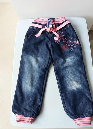 Теплые джинсовые брюки для девочки