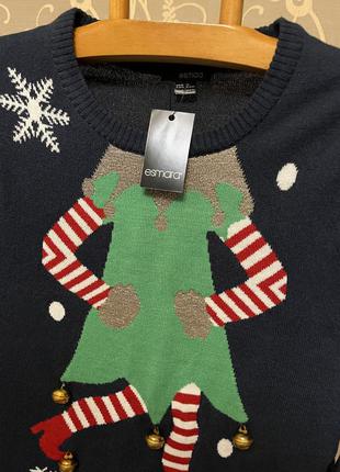 Дуже красивий і стильний брендовий светр з новорічним малюнком.9 фото