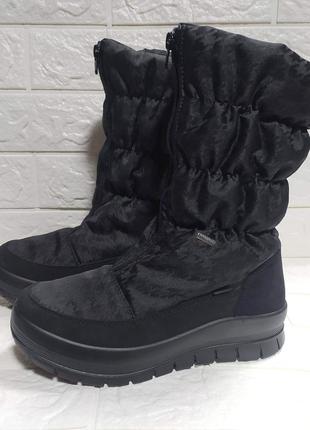 Стильные теплые женские сапоги дутики