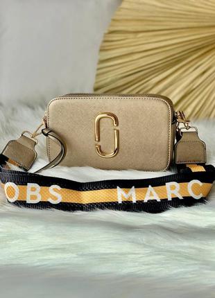 Трендова жіноча шкіряна сумочка в стилі marc jacobs snapshot gold клатч золота8 фото