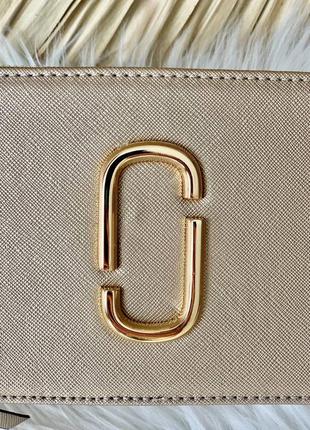 Трендова жіноча шкіряна сумочка в стилі marc jacobs snapshot gold клатч золота6 фото