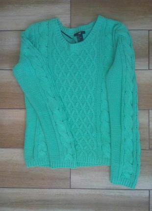 М'ятна кофтюля красивої в'язки.