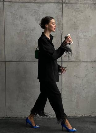 Костюм з пір’ям  марабу