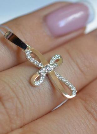 Серебряный крестик с золотыми вставками